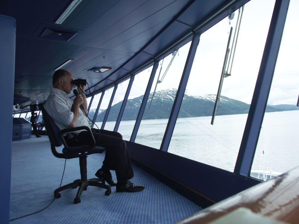 Murray Lundberg working as ship naturalist on the bridge of the Coral Princess