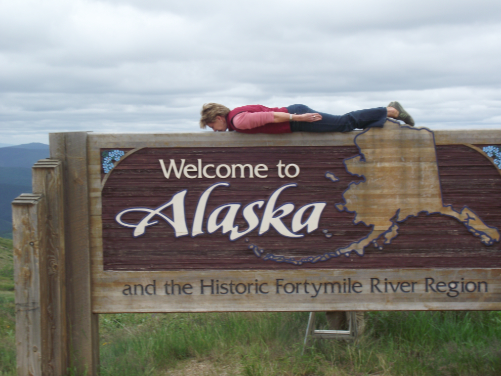 Planking on the Welcome to Alaska sign