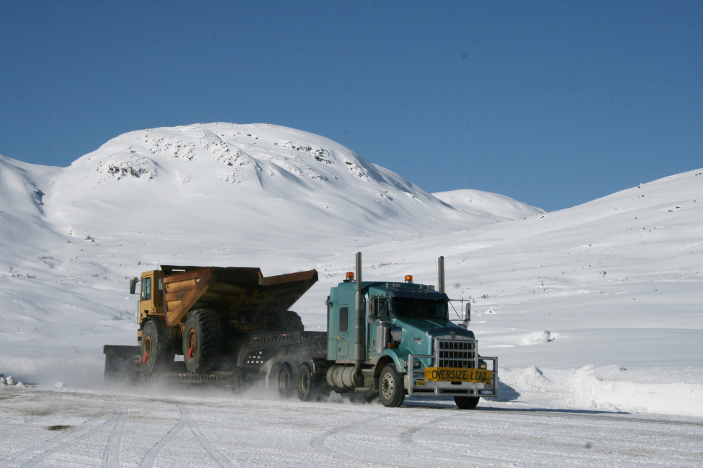 Mining truck being hauled through the White Pass