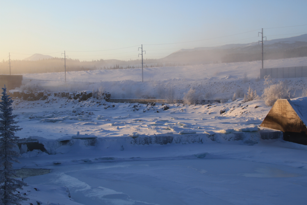 The frozen Yukon River at the Whitehorse power dam