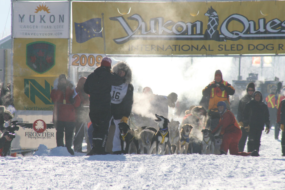 Organized chaos at the Yukon Quest starting line, getting Hans Gatt’s team lined up.