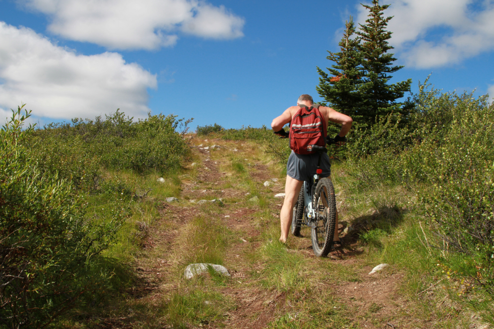 Murray Lundberg with his e-bike on Mt. McIntyre at Whitehorse, Yukon