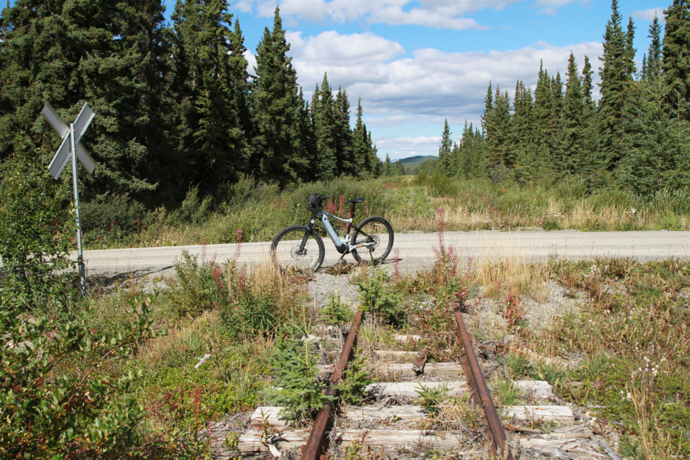 E-bike on the overgrown White Pass & Yukon Route railway line between Spirit Lake and Carcross, Yukon