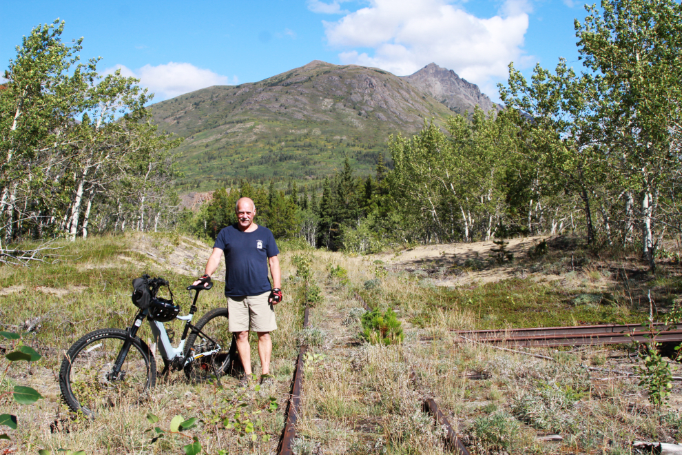 Murray Lundberg with his e-bike on the White Pass & Yukon Route railway line just north of Carcross, Yukon
