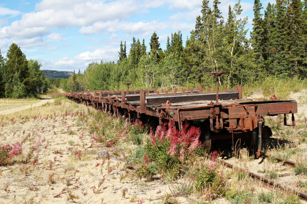 A line of flatcars on the White Pass & Yukon Route railway at Carcross, Yukon