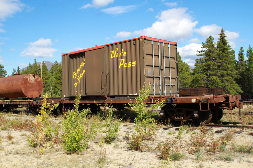 This boxcar - a shipping container on flatcar #1165 - has been used by the WP&YR railway for Chilkoot Trail hikers, but I think the pandemic halted that service.