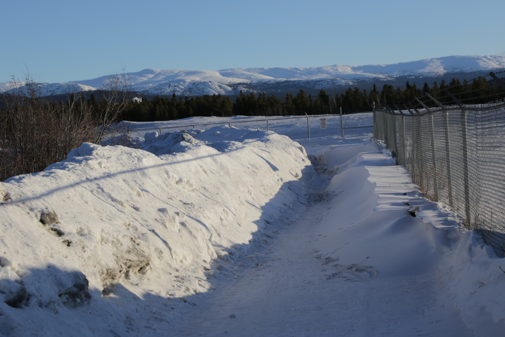 Snowdrifts across the Whitehorse airport trails