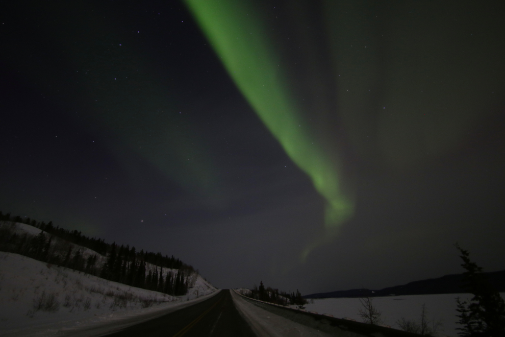 Aurora borealis over the Alaska Highway just east of Whitehorse, Yukon