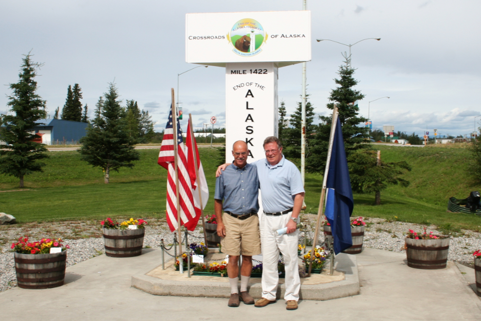 Tour driver/guide Murray Lundberg with tour escort Kevin Maher at the End of the Alaska Highway monument at Delta Junction.