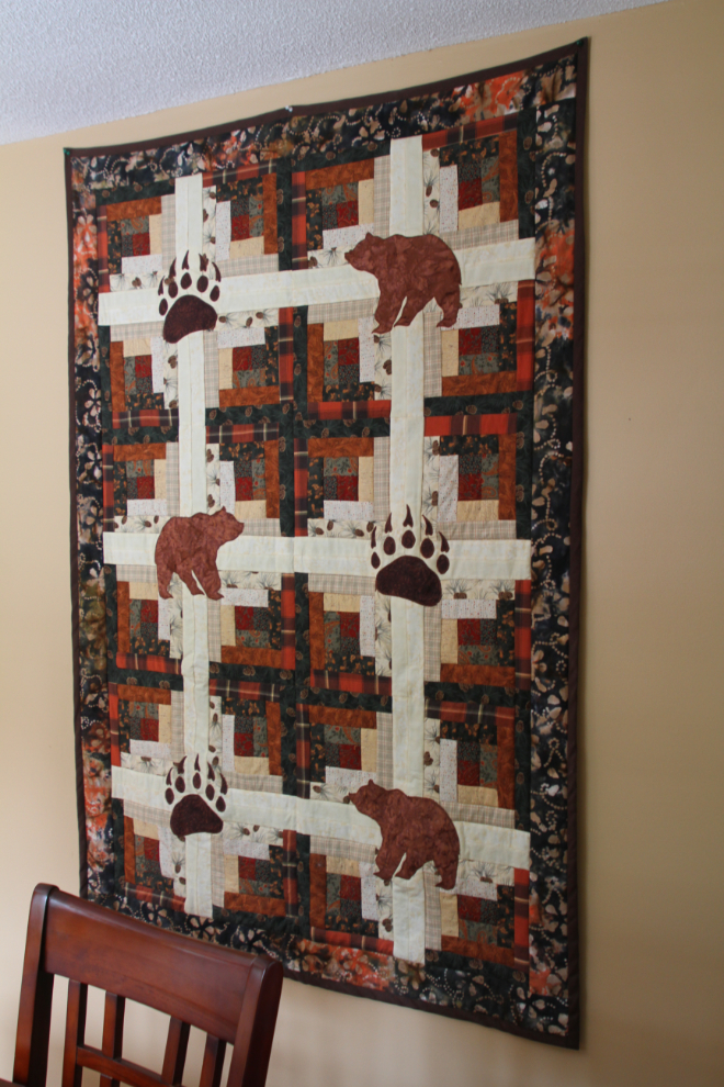 A beautiful 30x48-inch grizzly-design quilt created by Sarah Lord, a summer resident of Chicken, Alaska