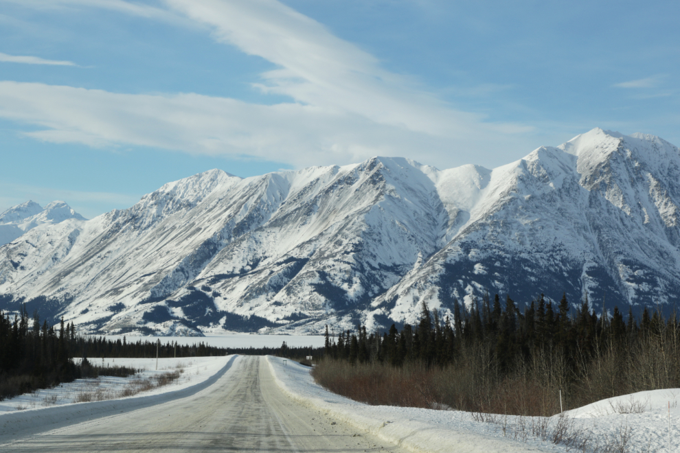 The Alaska Highway, dropping down to Kluane Lake in February