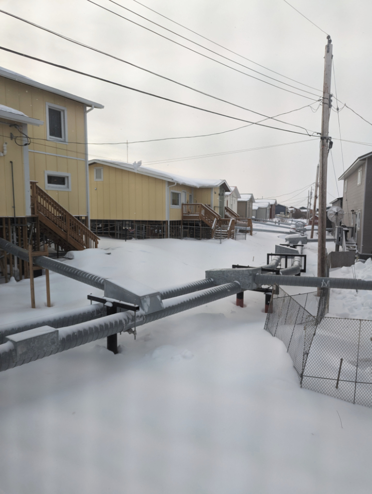 Residential services in above-ground utilidors at Inuvik, NWT.