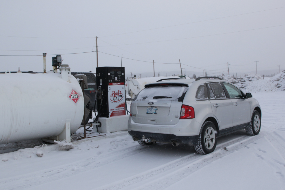 Fuelling up the car at Inuvik, NWT - at $2.33 per liter.