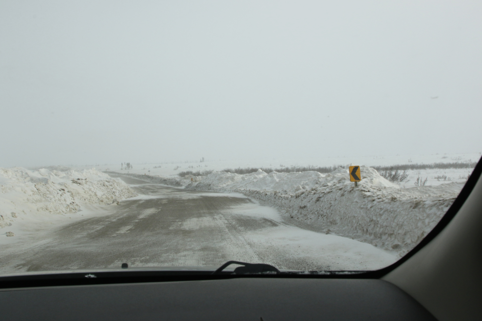 Deep snowdrifts on the Inuvik Tuktoyaktuk Highway (ITH) in April.
