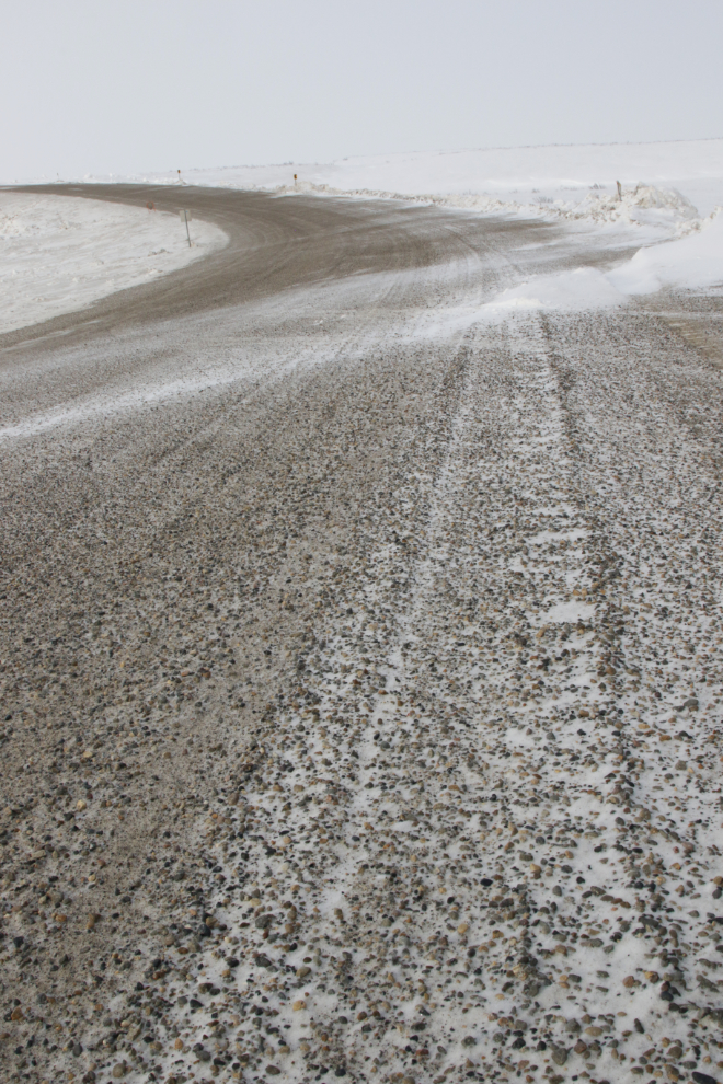 The surface of the Inuvik Tuktoyaktuk Highway (ITH) in April.