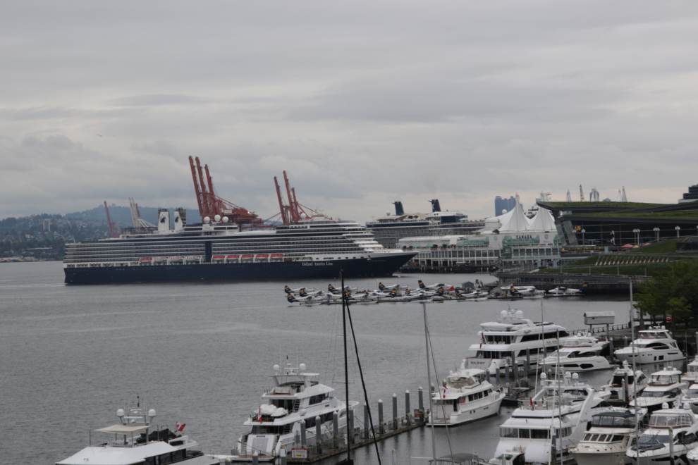 The cruise ship Nieuw Amsterdam pulling up to Canada Place in a light drizzle.