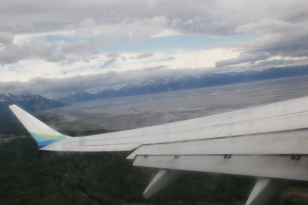 Climbing out over the mud flats of Cook Inlet and the mouth of Turnagain Arm.