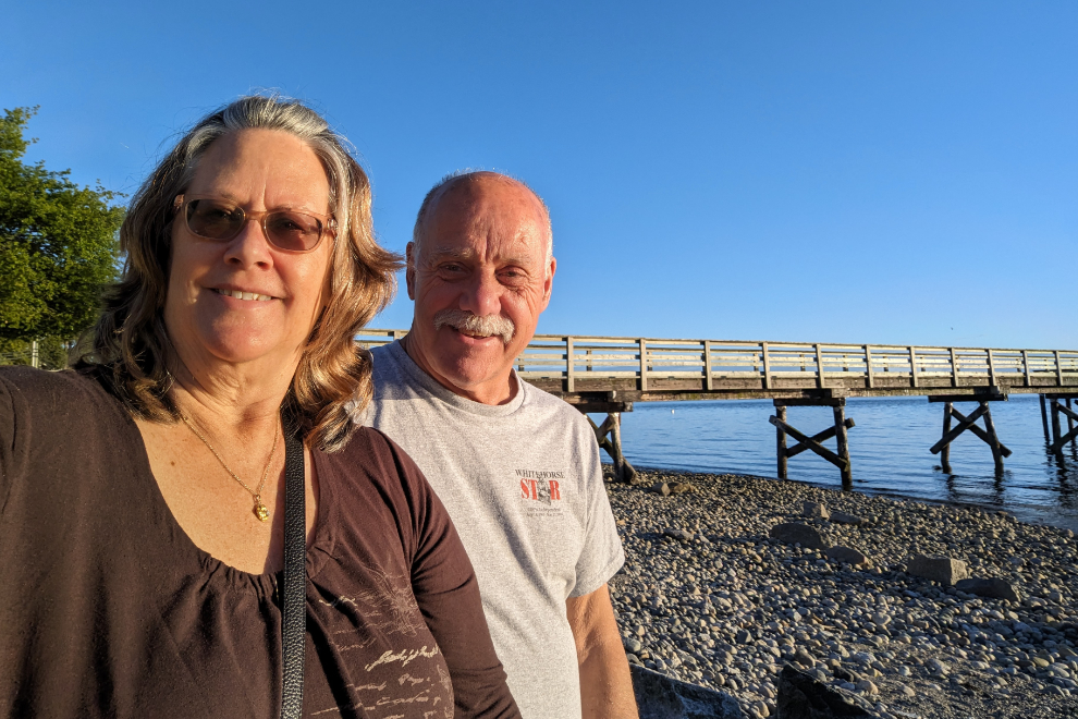 Cathy Dyson and Murray Lundberg on the beach at Davis Bay, BC.