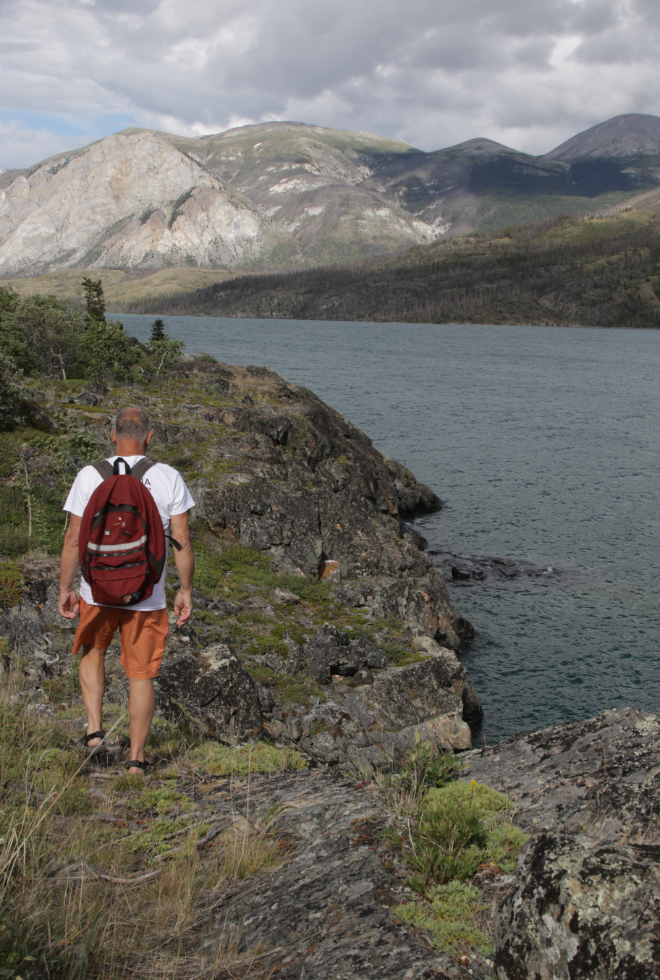 Hiking a faint ancient trail at Conrad Campground, Yukon.