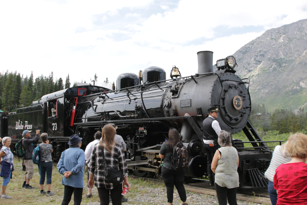 A White Pass steam train excursion at Bennett, BC - 1947 Baldwin locomotive #73.