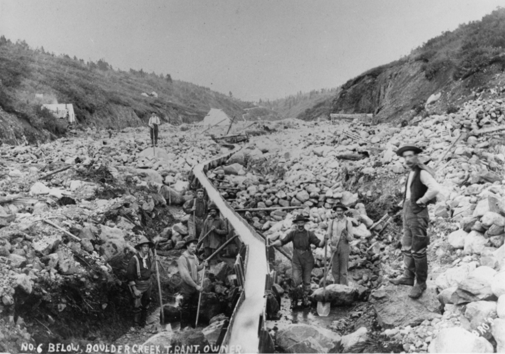 Placer gold mining on Boulder Creek at Atlin, BC, ca. 1899-1900.