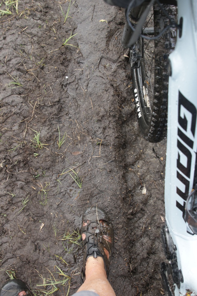 The muddy trail to the historic wooden Boulder Creek dam at Atlin, BC.