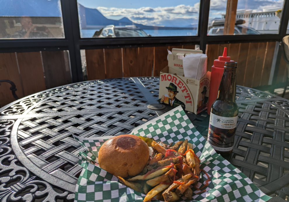 A burger and a Yukon beer on the patio of the Atlin Mountain Inn's bar.