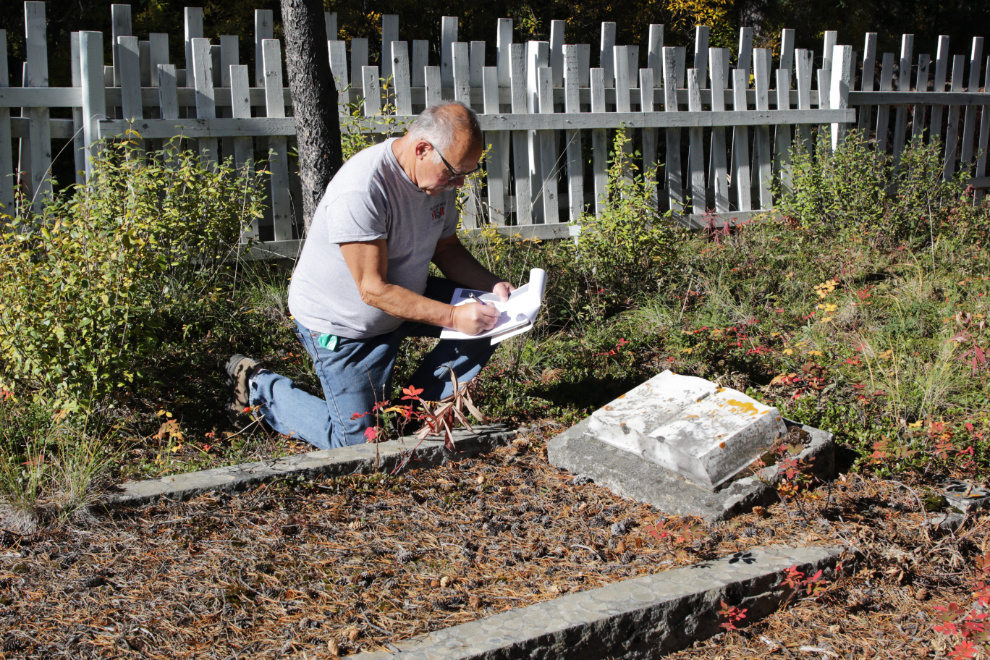 Murray Lundberg documenting the Atlin Pioneer Cemetery. 