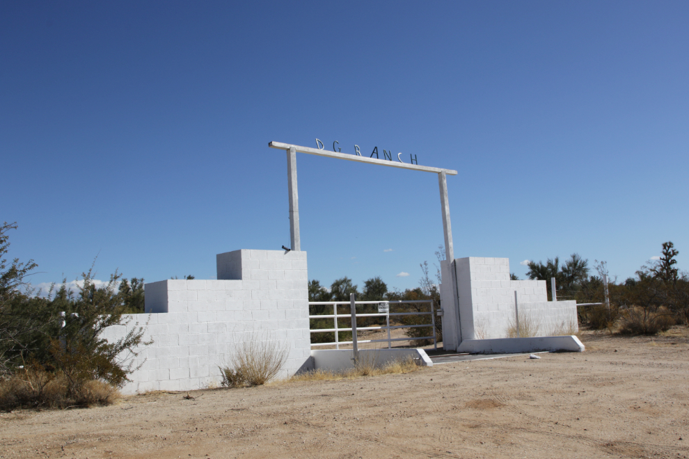 A large gate leading to the DG Ranch, an equestrian center along Arizona Highway 93.