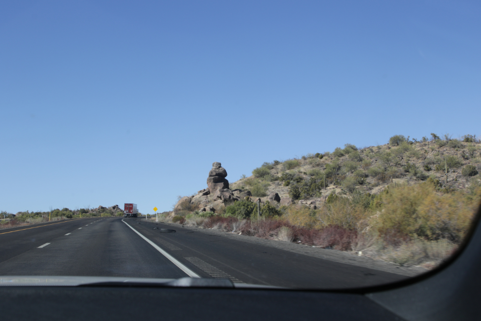 Strange rock piles along Arizona Highway 93.