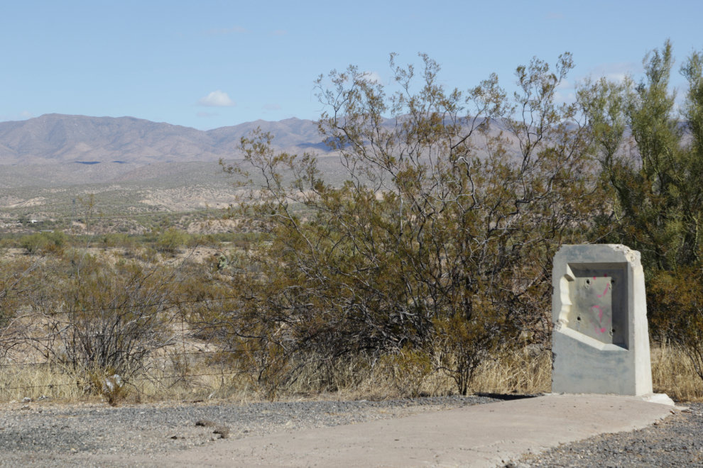 A vandalized historic site along Arizona Highway 93.