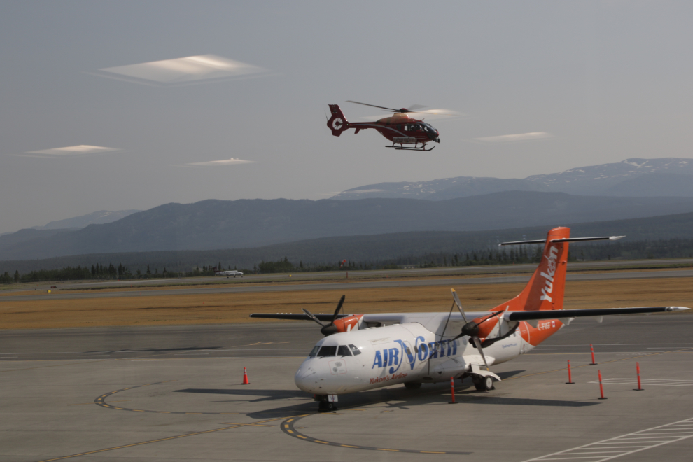 Airplane-watching at Erik Nielsen Whitehorse International Airport while waiting for our flight.