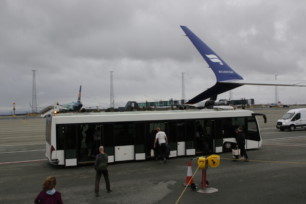 Transferring passengers to and from planes by bus at KEF, Reykjavik–Keflavík Airport, Iceland.