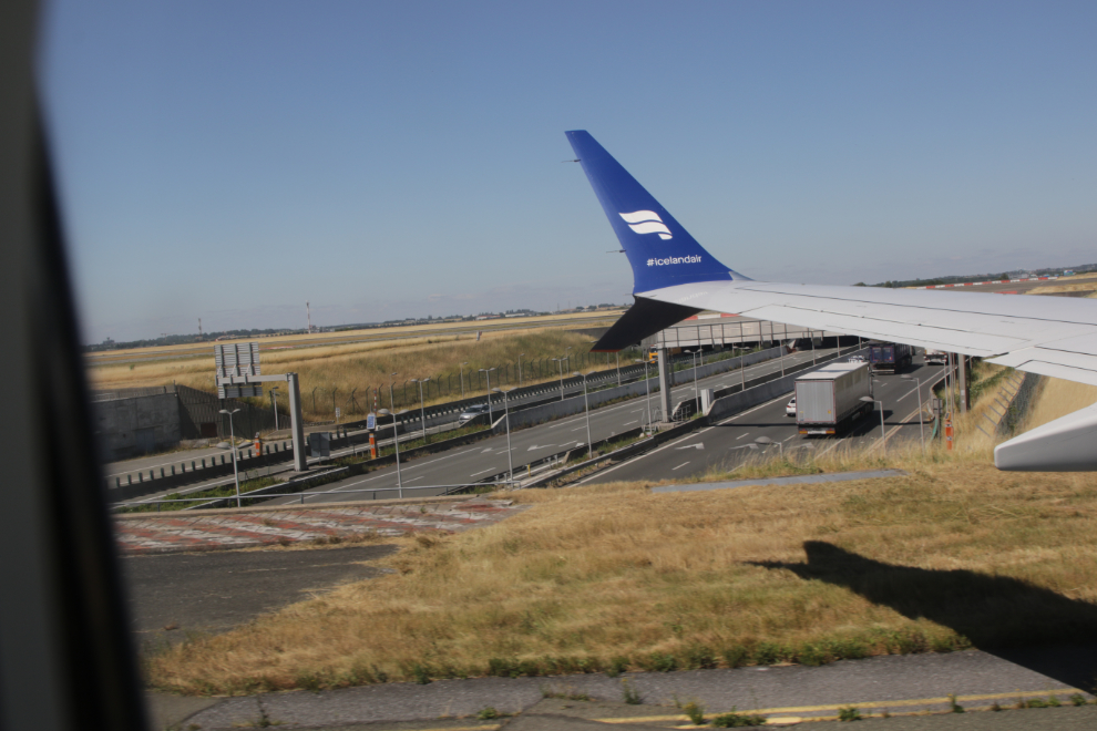 Taxxing over a freeway at CDG, Paris, in an Icelandair Boeing 737-8 MAX.