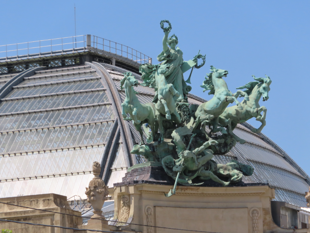 Touring Paris by open-top bus - one of two bronze quadrigas (a chariot drawn by four horses abreast) by Georges Récipon, at the Grand Palais.