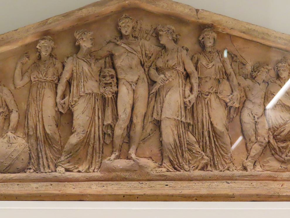 A small model for a pediment on the Louvre palace is based on 'Apollo Rewards the Arts and Sciences.'