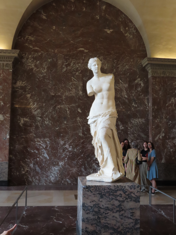 Aphrodite, commonly called Venus de Milo, at the Louvre Museum in Paris.