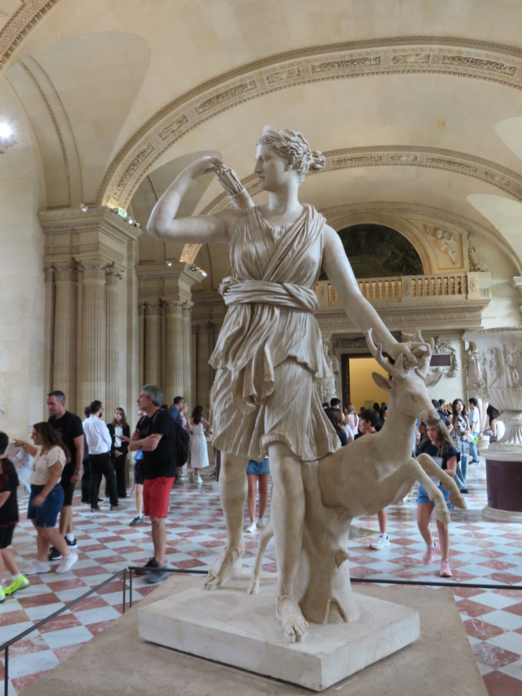 Diana of Versailles, also known as Diana the Huntress, Artemis of the Chase, and Artemis with the Hind, at the Louvre Museum in Paris.