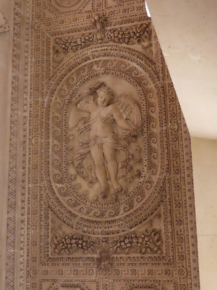 Amazing detail on a ceiling at the Louvre Museum in Paris.