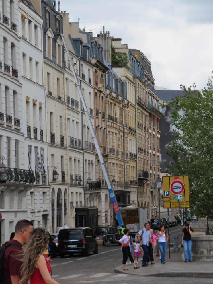 For many people in Paris, the way to move is to have a crane like this take your stuff out the main window of your apartment that overlooks the street.