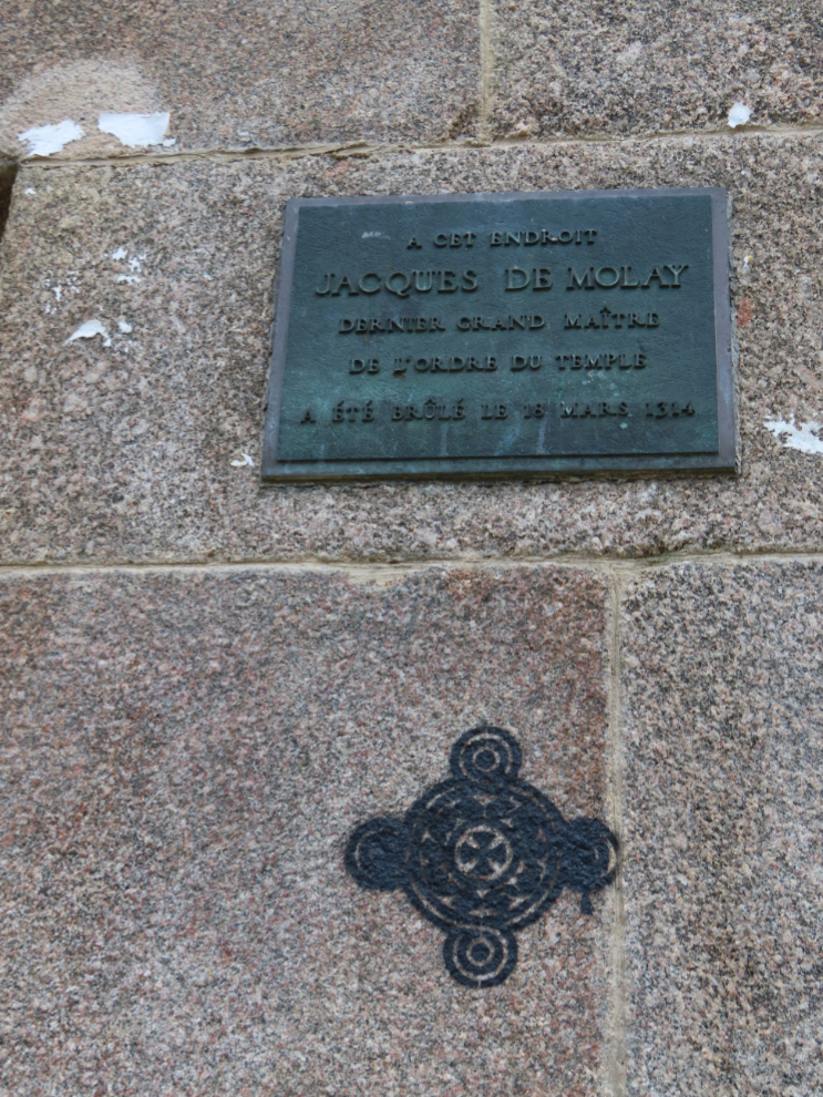 On March 18, 1314, Jacques de Molay was burnt at the stake on Ile de la Cite near what became the site of Pont Neuf, where this plaque is mounted.