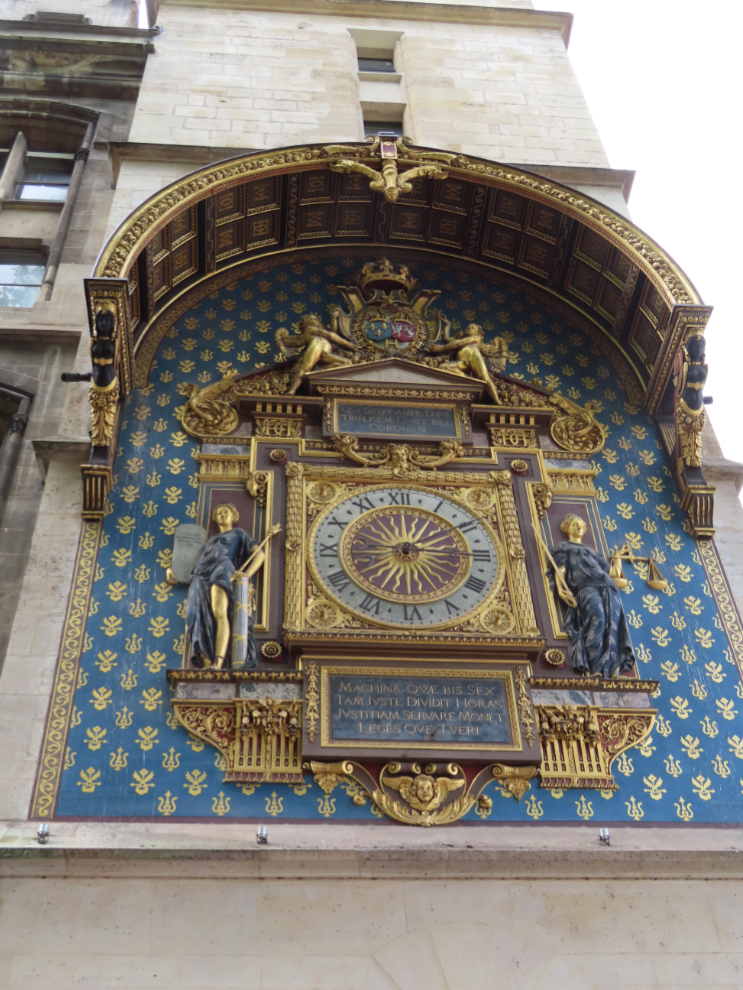This clock is mounted on the walls of the Conciergerie in the heart of the Ile de la Cite in Paris.