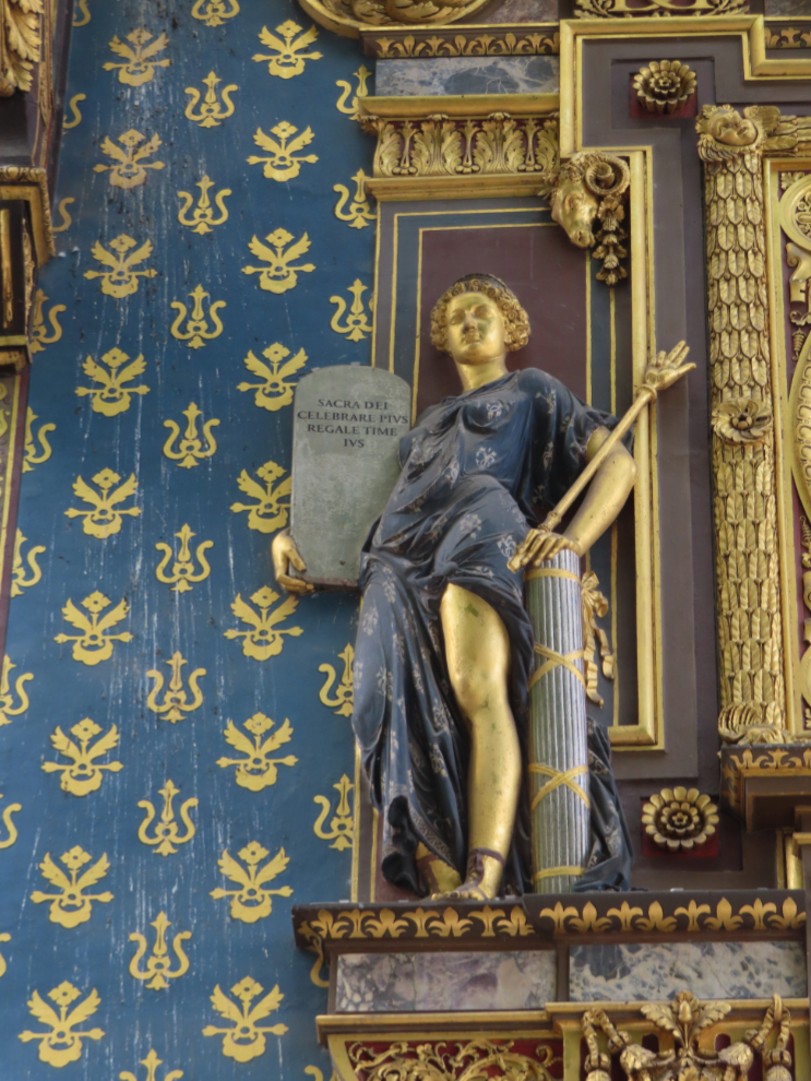 A figure on the clock mounted on the walls of the Conciergerie in the heart of the Ile de la Cite in Paris.