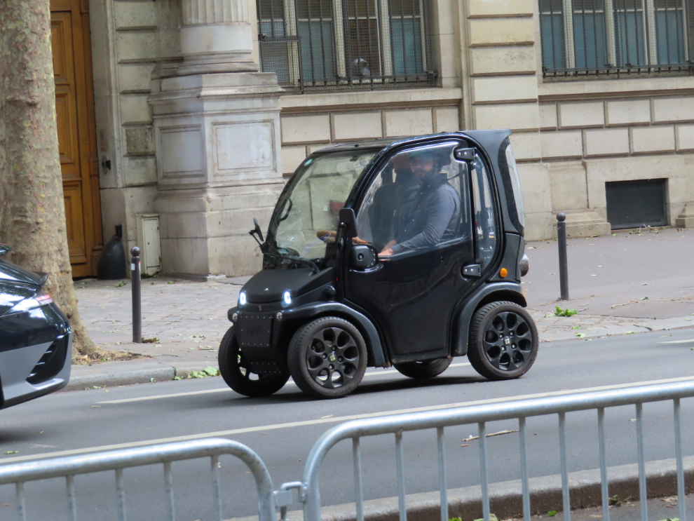 A tiny vehicle in Paris.