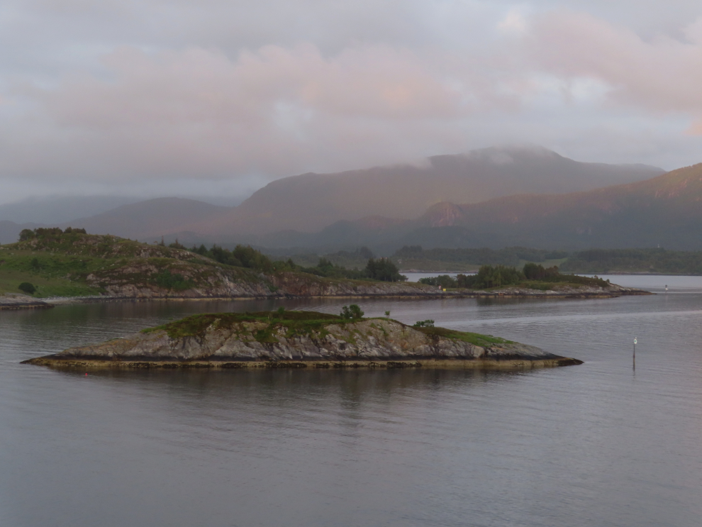 Passing through a very narrow channel along the coast of Norway.