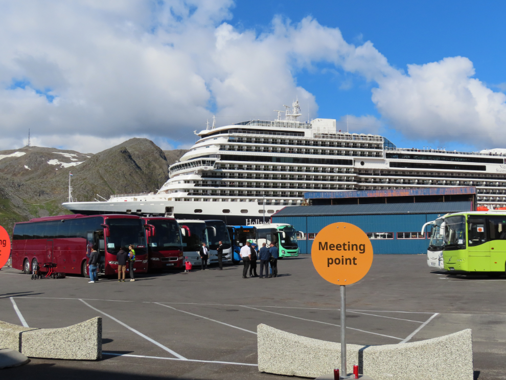 Tour busses and the Holland America cruise ship Nieuw Statendam at Honningsvag, Norway.