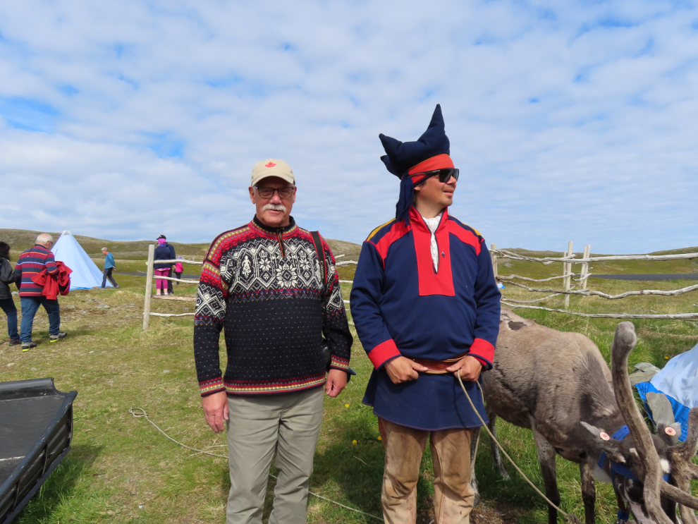 Murray Lundberg with a Sami man and his reindeer between Honningsvag and Nordkapp, Norway.