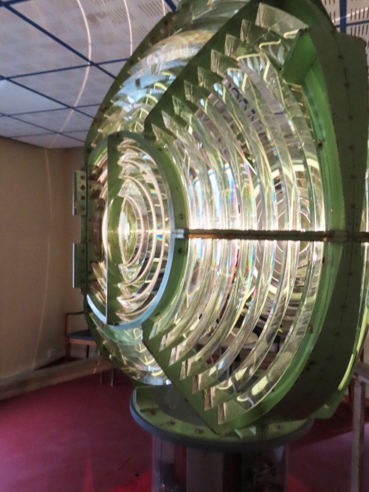 A Fresnel lens from a lighthouse, lit and turning, in the museum at Honningsvag, Norway.