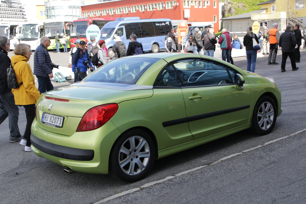 A cute hardtop convertible Peugeot at Honningsvag, Norway.