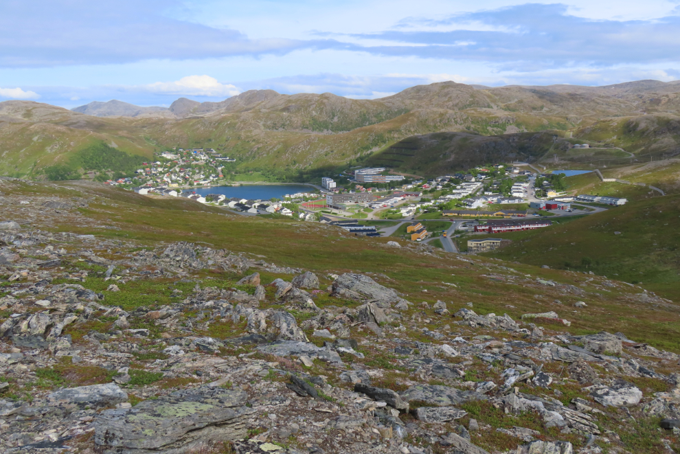 Hiking high above the communities surrounding the lake Gavpotjavri at Hammerfest, Norway.
